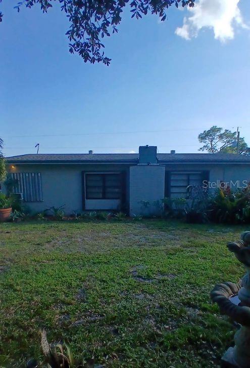 1286 Southwest Tropical Terrace Stuart, FL 34997 - Photo 5 of 28 a view of a backyard