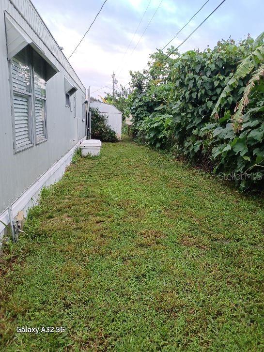 1286 Southwest Tropical Terrace Stuart, FL 34997 - Photo 7 of 28 a view of a back yard of the house