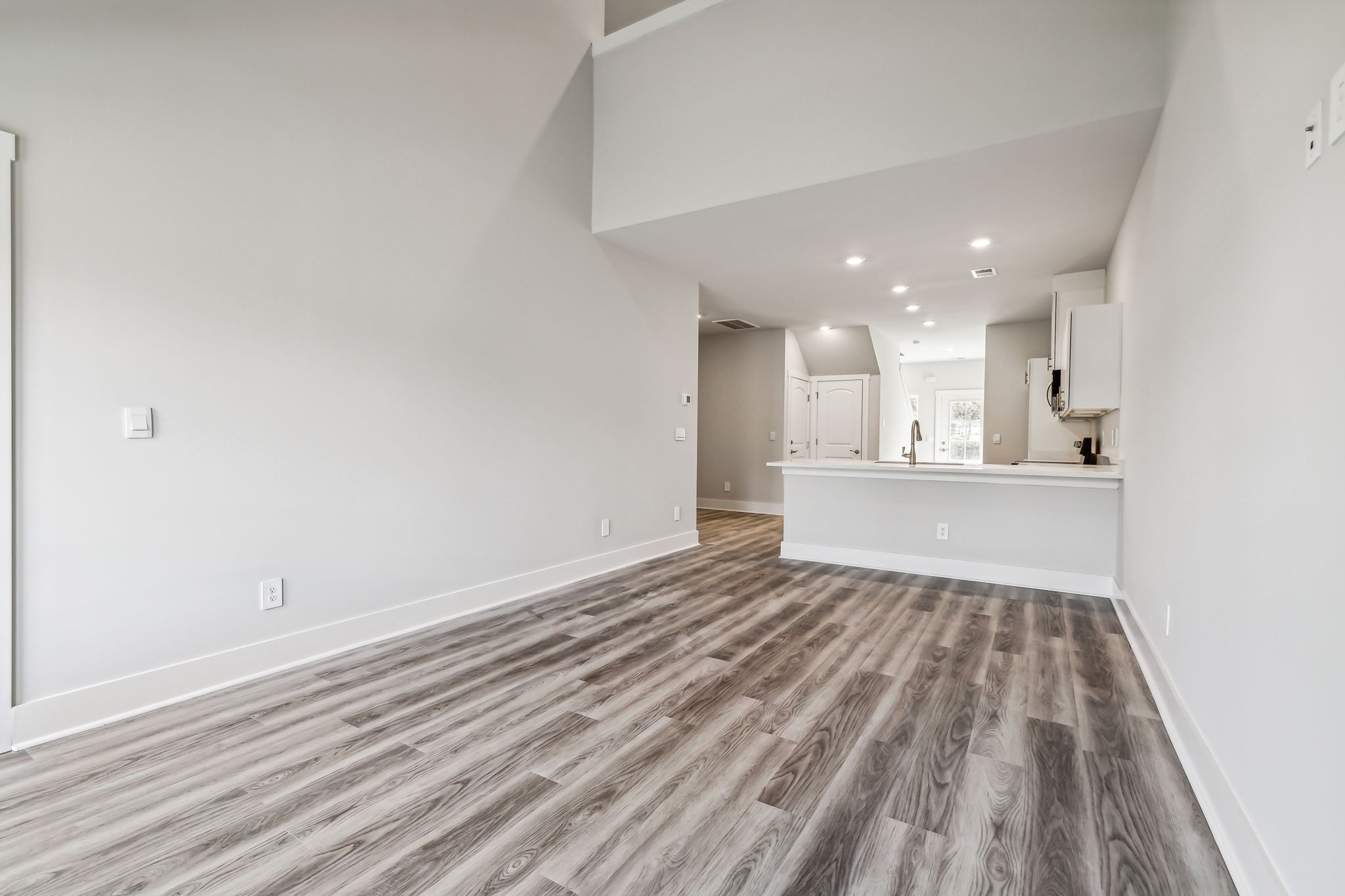 539 Tulip Springs Road Hermitage, TN 37076 - Photo 21 of 69 a view of a kitchen with wooden floor and a sink