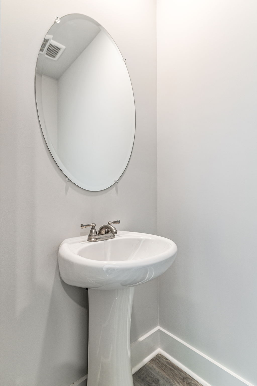 539 Tulip Springs Road Hermitage, TN 37076 - Photo 31 of 69 a bathroom with a sink a mirror and vanity