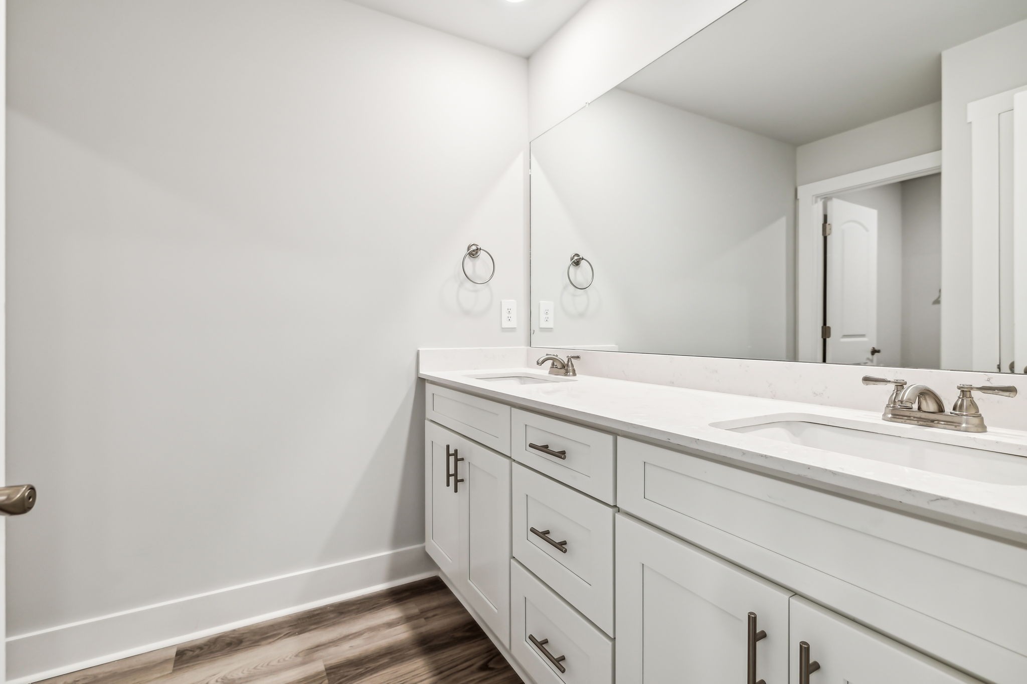 539 Tulip Springs Road Hermitage, TN 37076 - Photo 37 of 69 a bathroom with a double vanity sink and a mirror