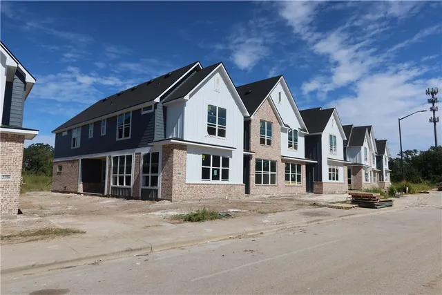 a view of a street in front of house