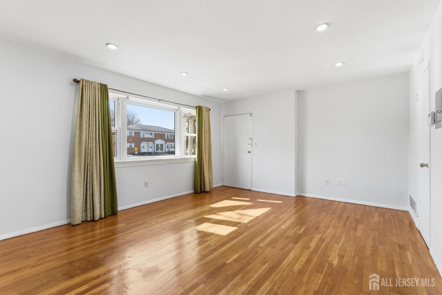 161 Evergreen Road, Unit 2A Edison, NJ 08837 - Photo 5 of 15 a bedroom with a bed and a window