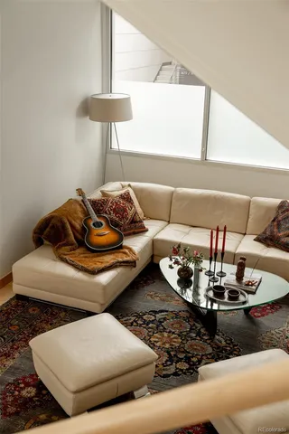 a living room with furniture and a couch