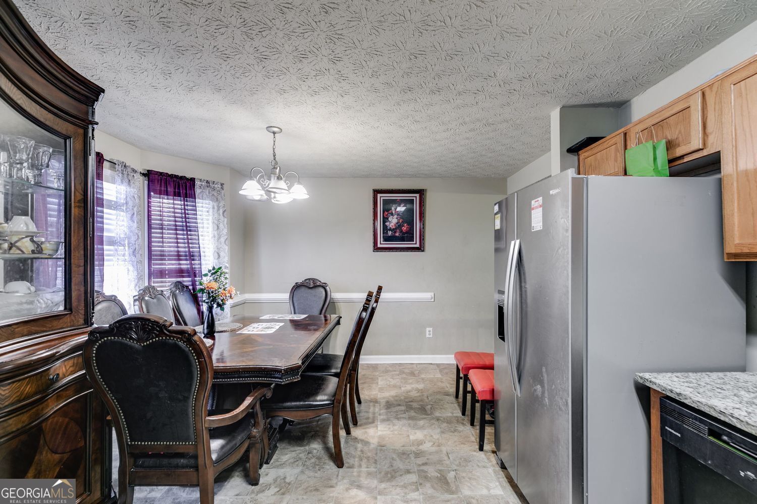 674 Fairview Drive Dallas, GA 30157 - Photo 11 of 24 a view of a dining room with furniture