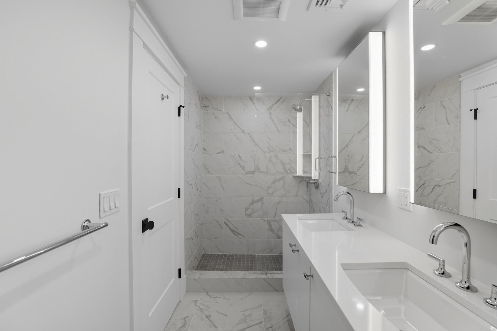 2 Mariner Way Nantucket, MA 02554 - Photo 26 of 34 a bathroom with a double vanity sink mirror and shower
