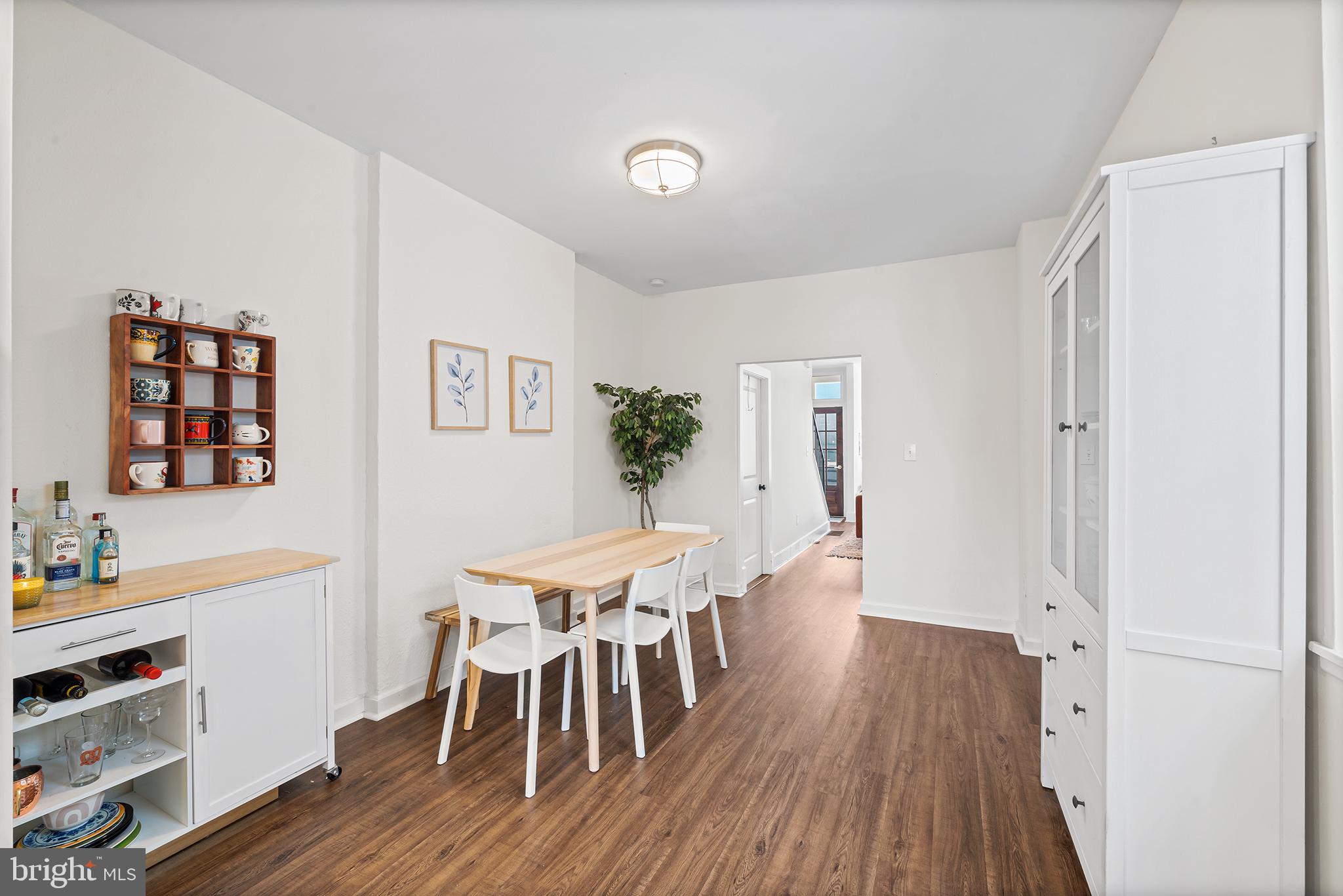 107 Master Street Philadelphia, PA 19122 - Photo 10 of 24 a view of a dining room with furniture and wooden floor