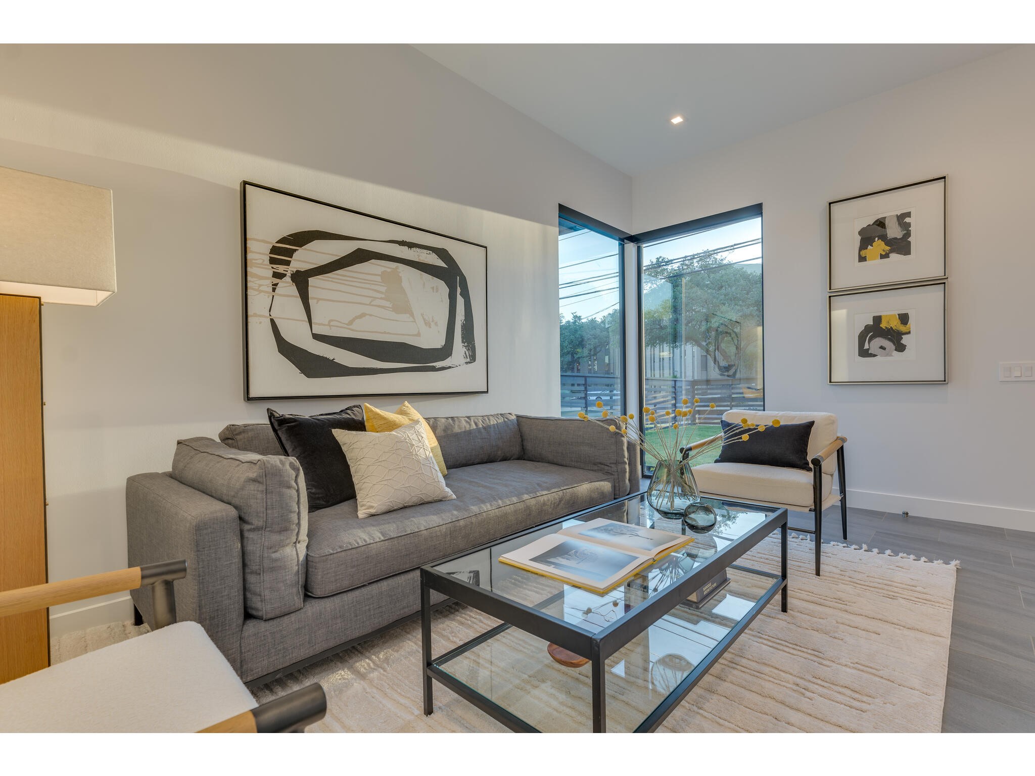 3617 Bull Creek Road Austin, TX 78731 - Photo 2 of 17 a living room with furniture and a floor to ceiling window