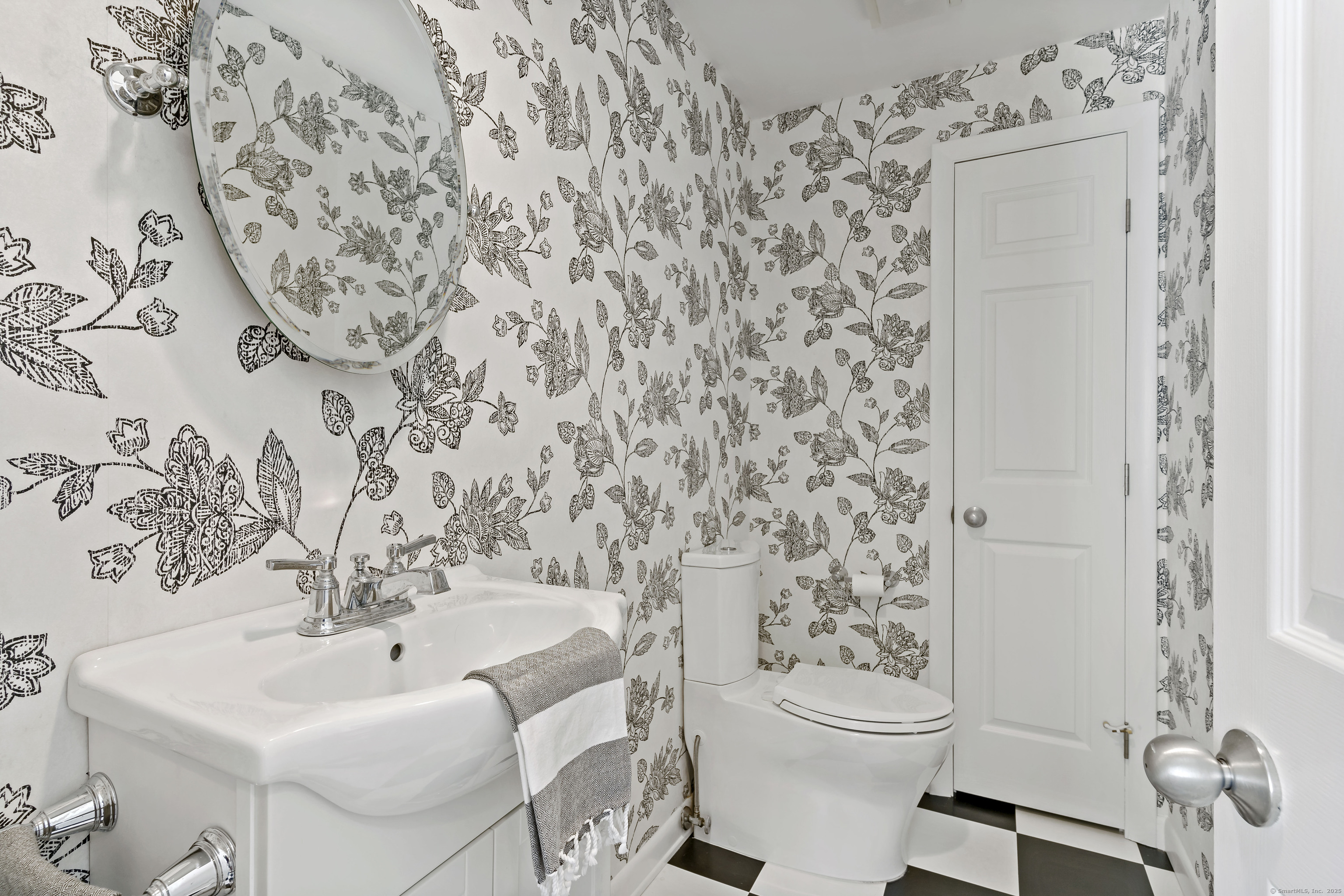 43 Shore Road Clinton, CT 06413 - Photo 16 of 32 a bathroom with a sink and a toilet