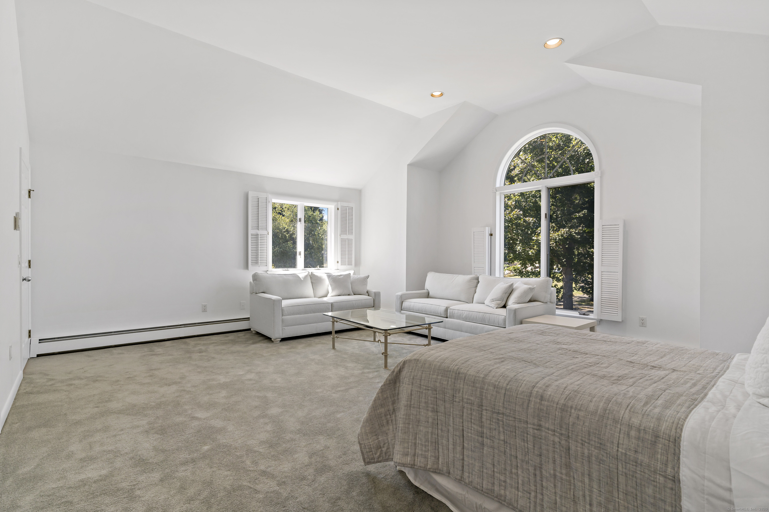 43 Shore Road Clinton, CT 06413 - Photo 27 of 32 a bedroom with bed and a window