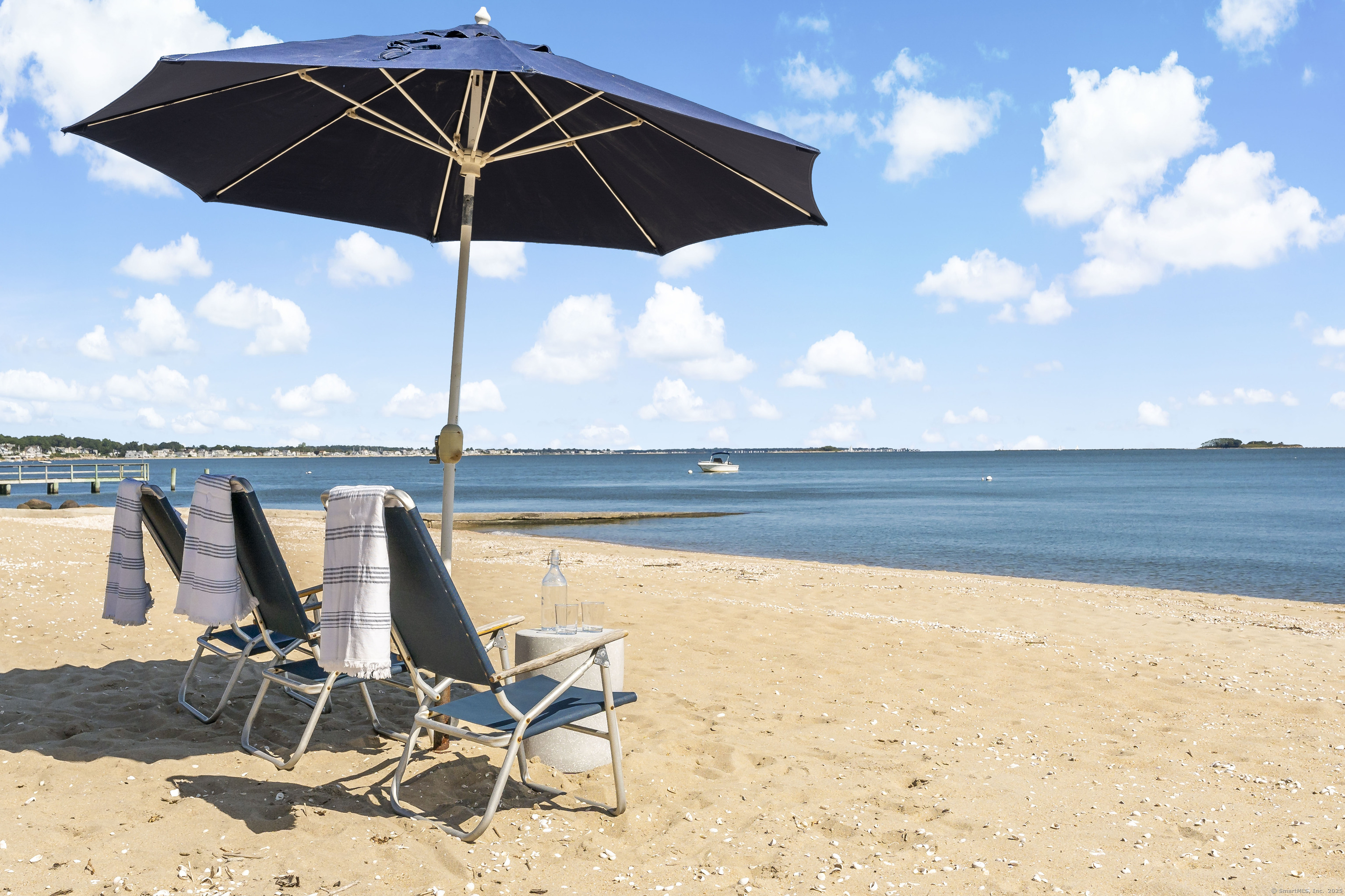 43 Shore Road Clinton, CT 06413 - Photo 32 of 32 a view of a lake from a yard