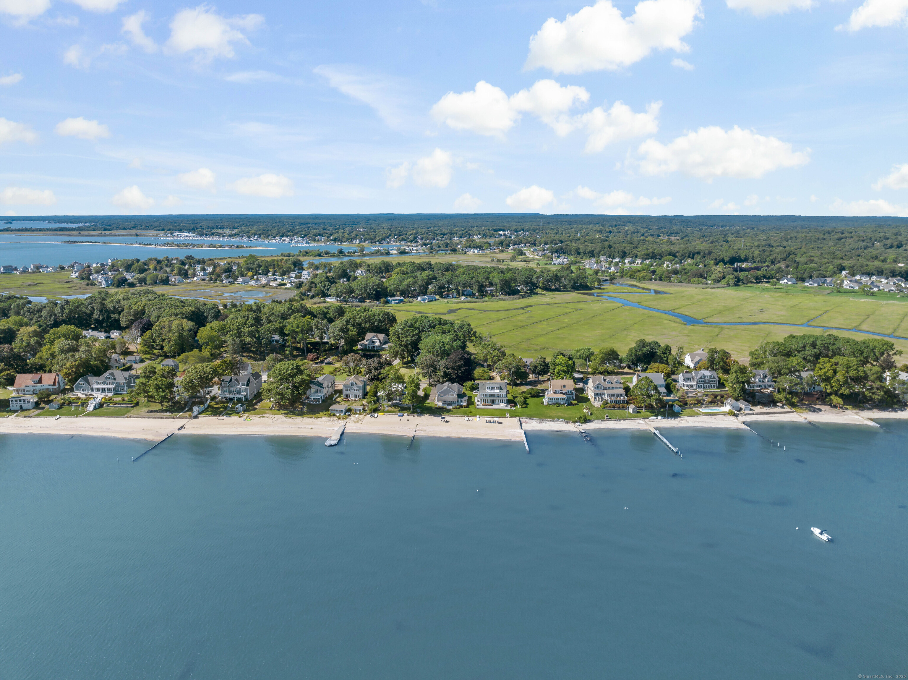 43 Shore Road Clinton, CT 06413 - Photo 4 of 32 a view of a city with an ocean