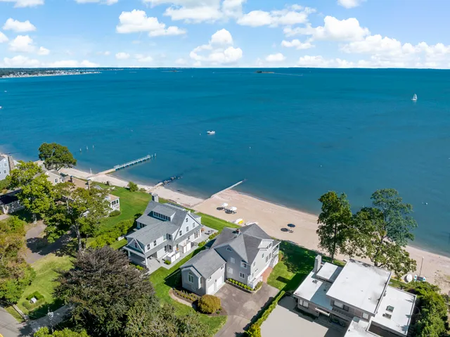 an aerial view of a house with a garden
