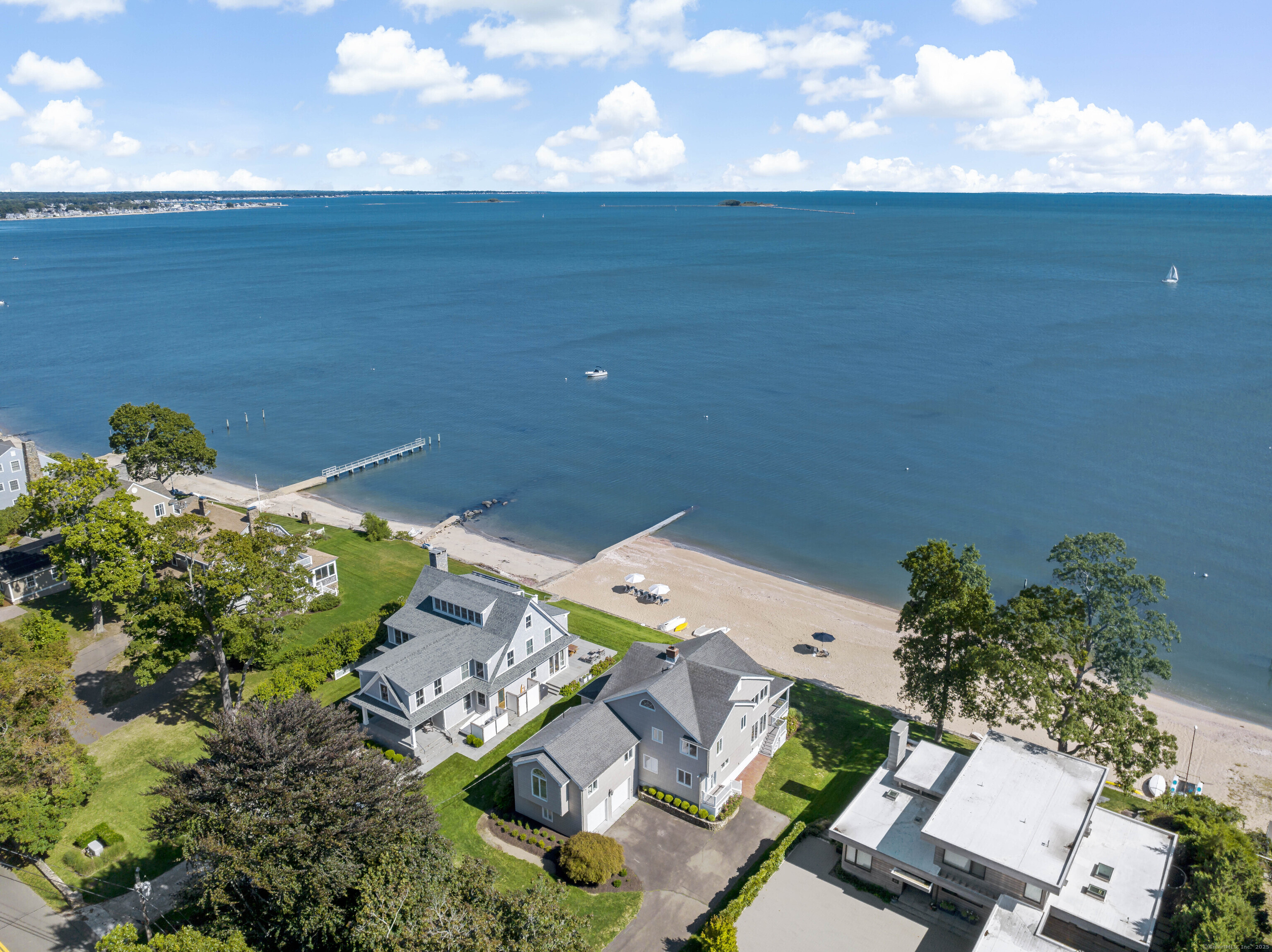 43 Shore Road Clinton, CT 06413 - Photo 7 of 32 an aerial view of a house with a garden