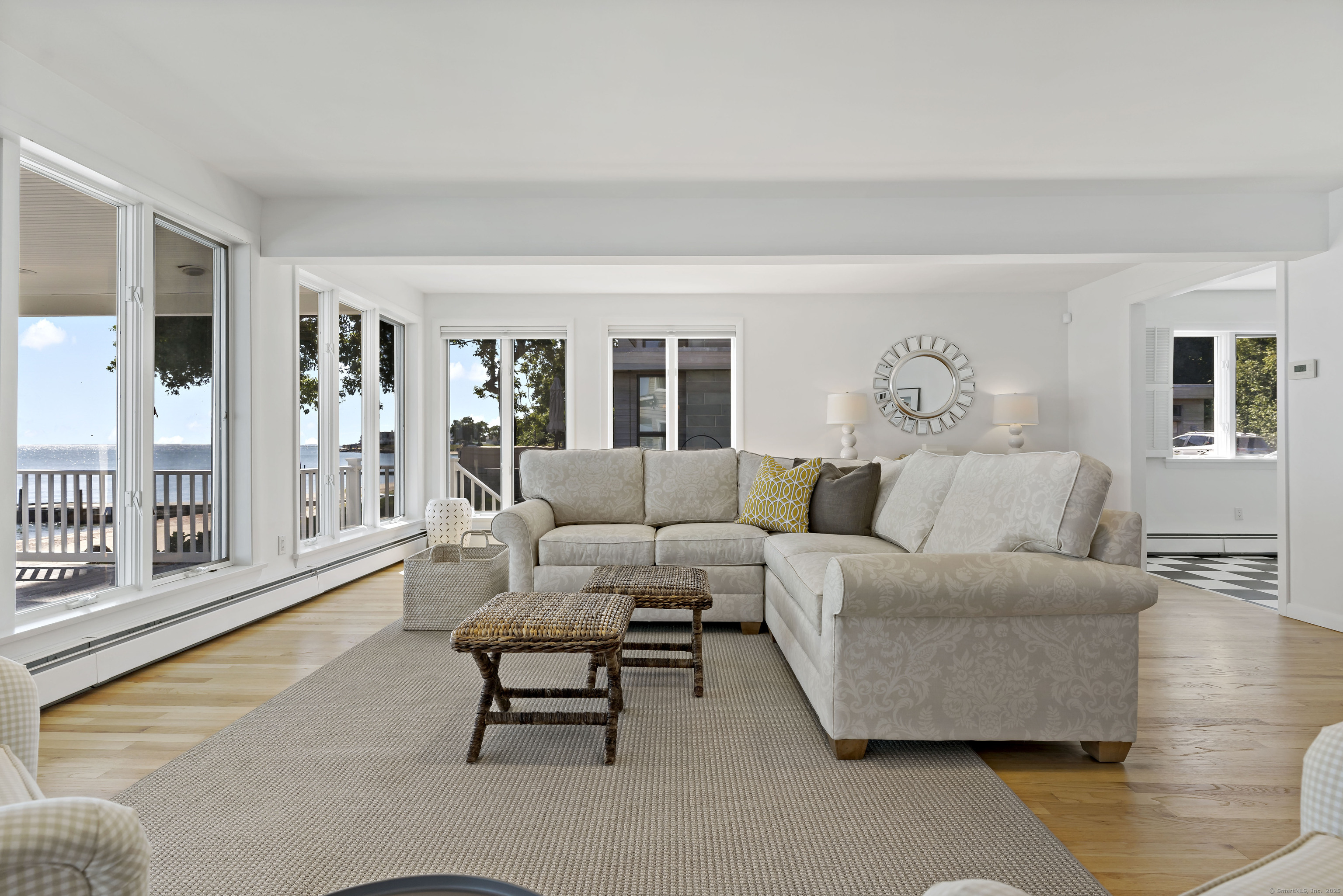 43 Shore Road Clinton, CT 06413 - Photo 9 of 32 a living room with furniture and a large window