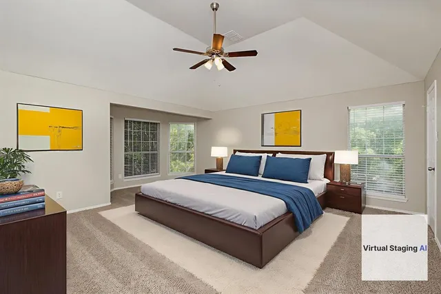 a bedroom with a bed and window