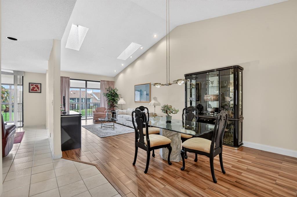 7873 La Mirada Drive, Unit 7873 Boca Raton, FL 33433 - Photo 8 of 40 a dining room with furniture and window