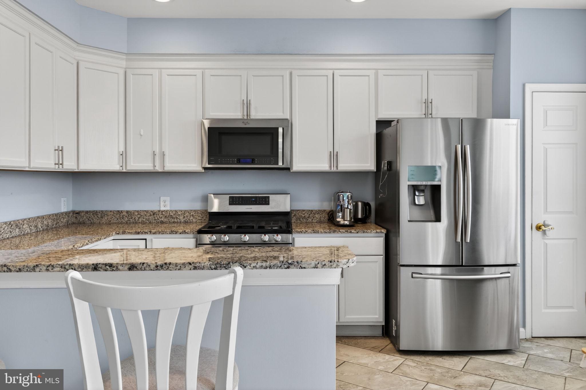 6006 Lincolnia Road Alexandria, VA 22312 - Photo 12 of 42 Modern kitchen with sleek finishes.