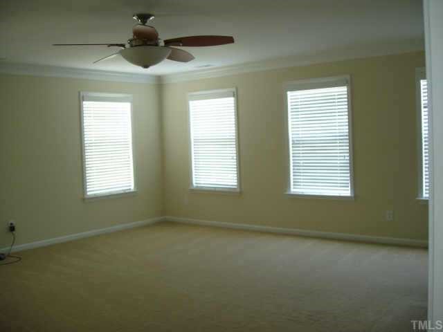 10632 Friendly Neighbor Lane Raleigh, NC 27614 - Photo 12 of 12 Master bedroom. Already moved out and YES, it's HUGE! 1 walk-in her closet, seperate his closet leading up to very large Master bath with garden tub and seperate shower.