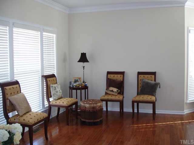 10632 Friendly Neighbor Lane Raleigh, NC 27614 - Photo 3 of 12 Entertain in style in this seperate formal livingroom with gleaming hardwood floor.