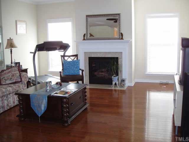 10632 Friendly Neighbor Lane Raleigh, NC 27614 - Photo 5 of 12 Yes, there is room for your anything and everything in this 'great' family room. Hardwood all through out with big wall space for your big TV and room enough for comfy couch to relax in.