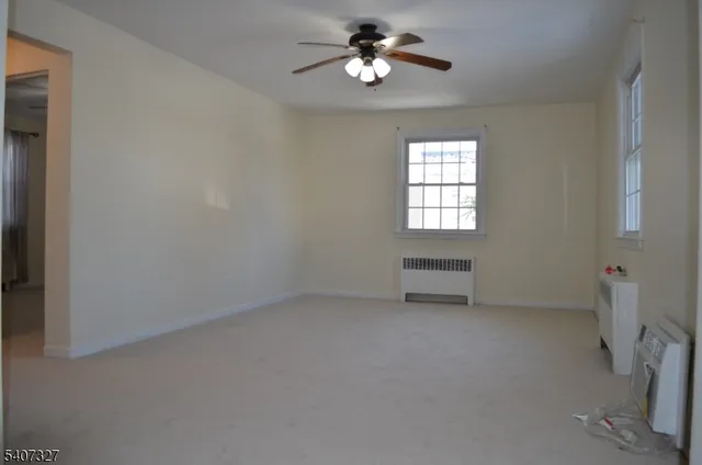 a view of empty room with a window