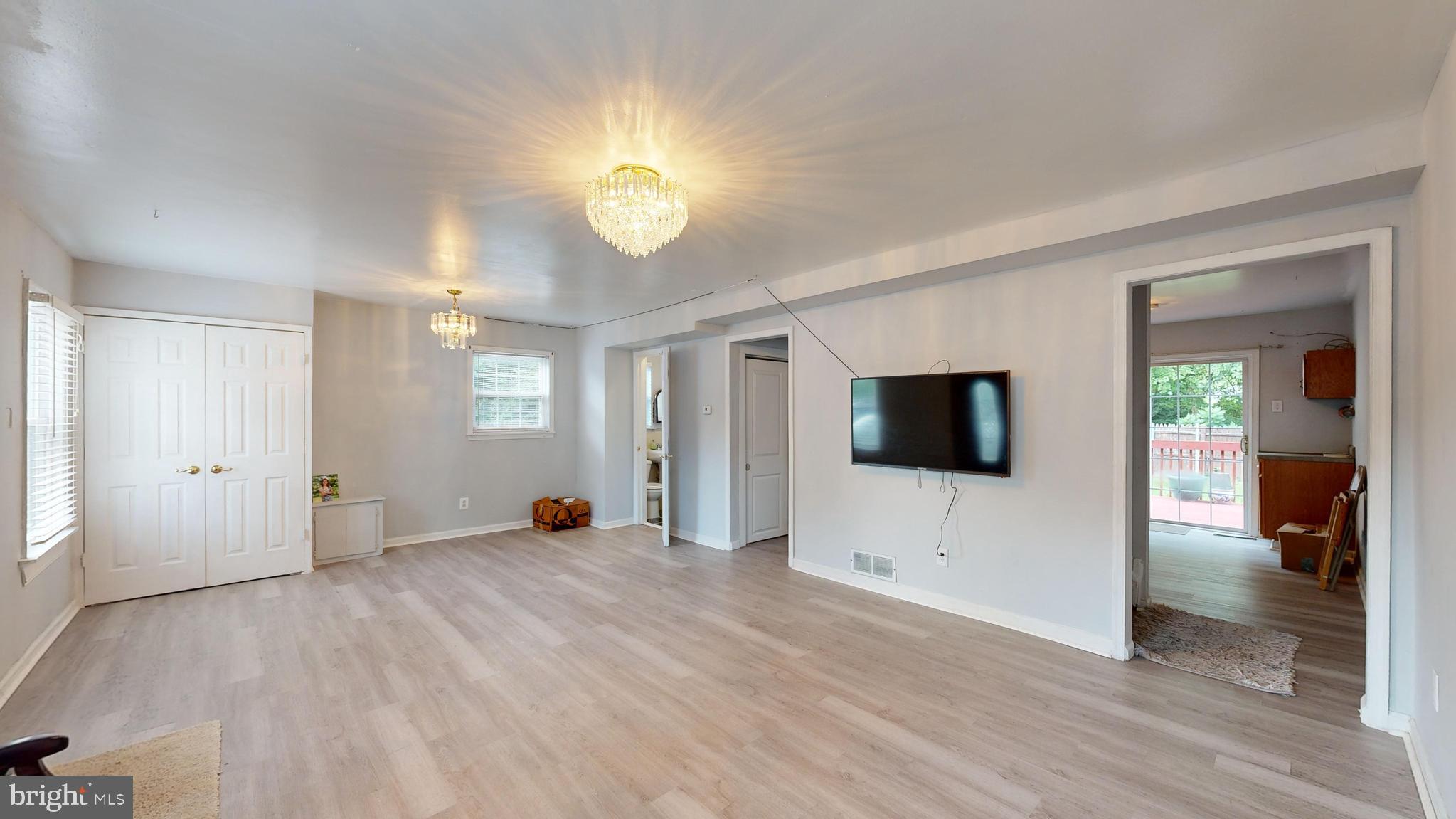 13 Teal Circle Newark, DE 19702 - Photo 2 of 29 a view of a livingroom with wooden floor and a flat screen tv