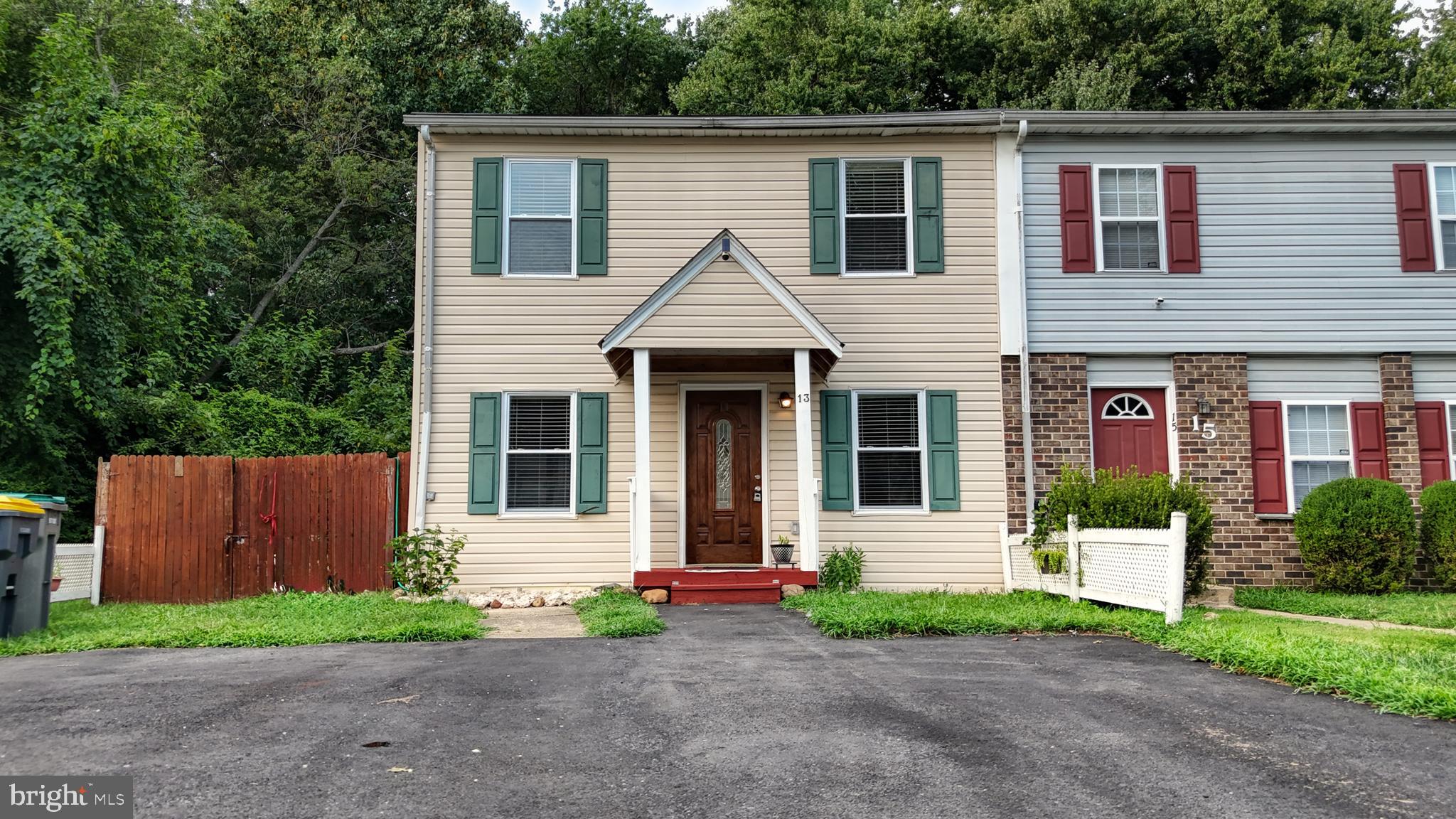 13 Teal Circle Newark, DE 19702 - Photo 29 of 29 a view of a house with a yard and a large tree