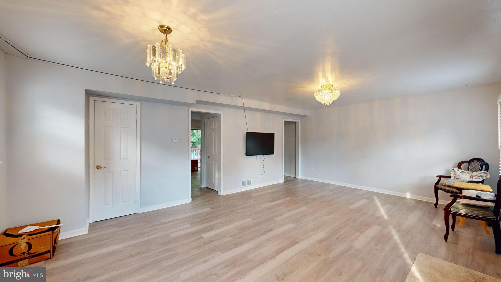 13 Teal Circle Newark, DE 19702 - Photo 3 of 29 a view of empty room with wooden floor