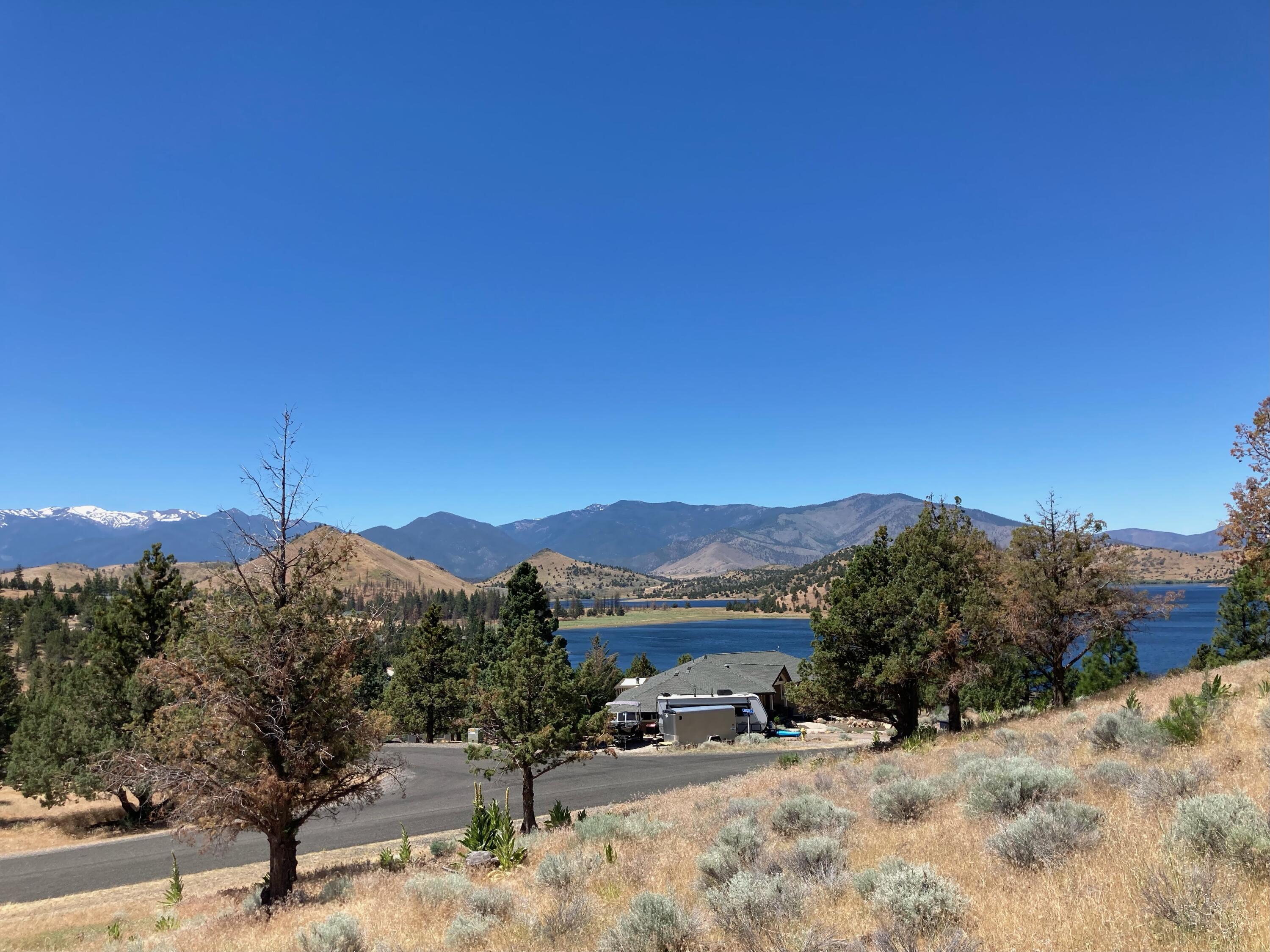 0 Saddle Ridge Road Weed, CA 96094 - Photo 6 of 9 a view of a house with a snow yard and mountain view