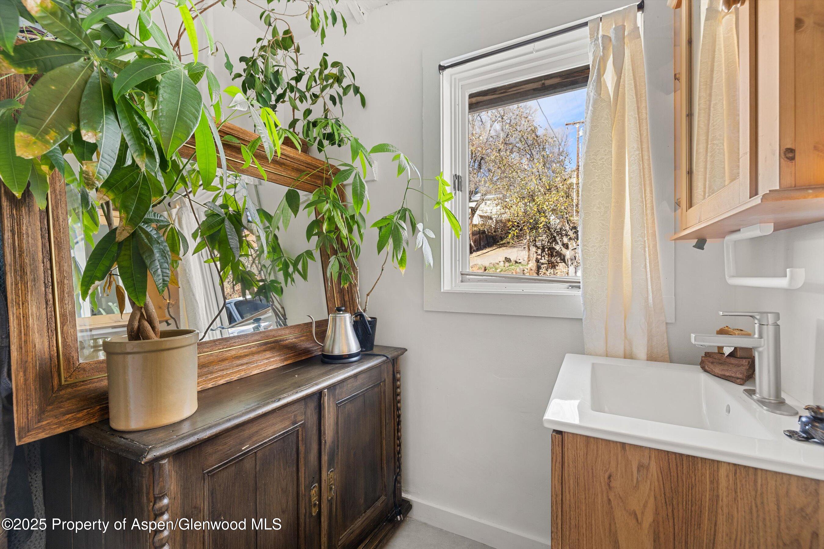 160 Midland Avenue Basalt, CO 81621 - Photo 12 of 13 a kitchen with a sink and a window