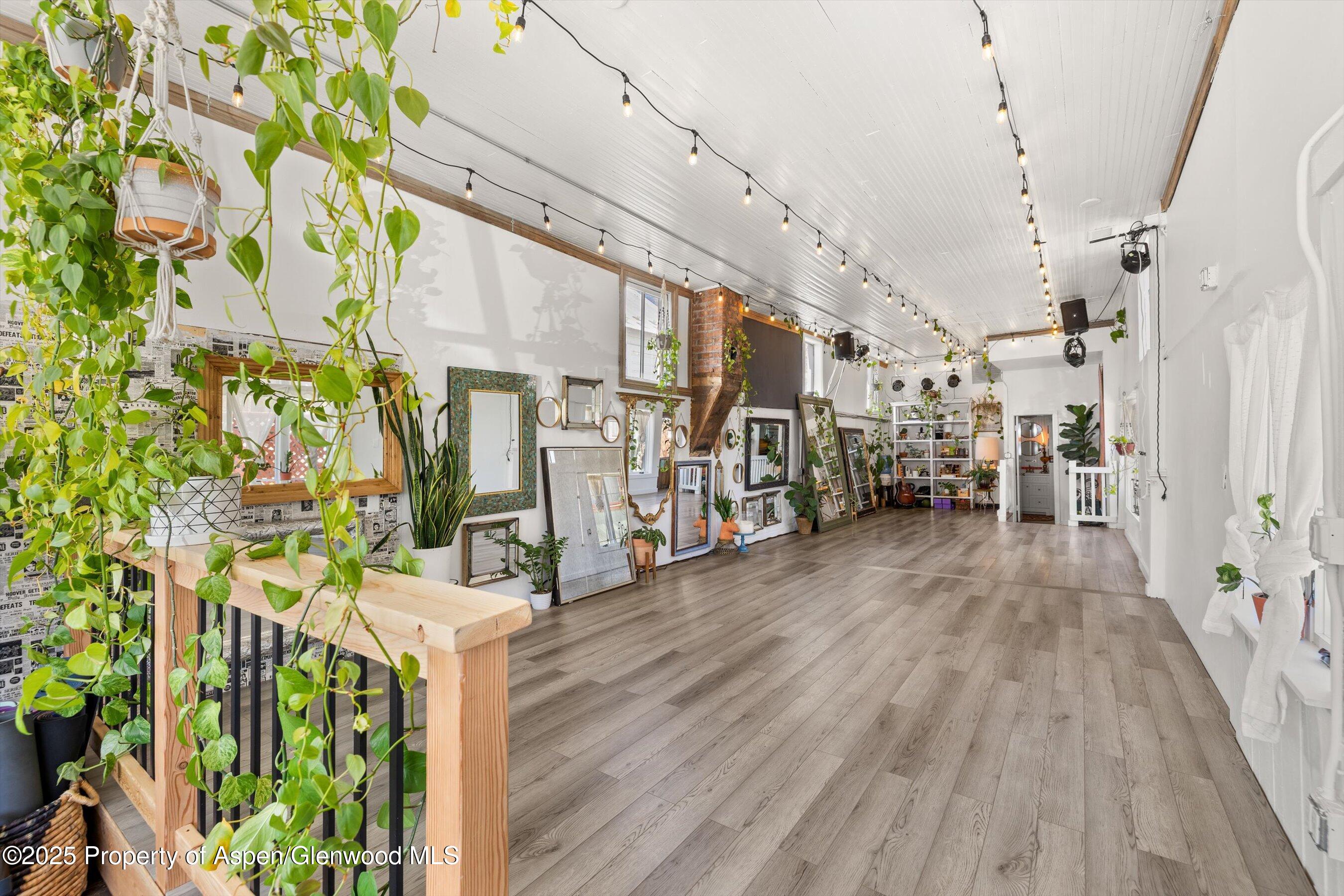 160 Midland Avenue Basalt, CO 81621 - Photo 4 of 13 a view of a porch with wooden floor