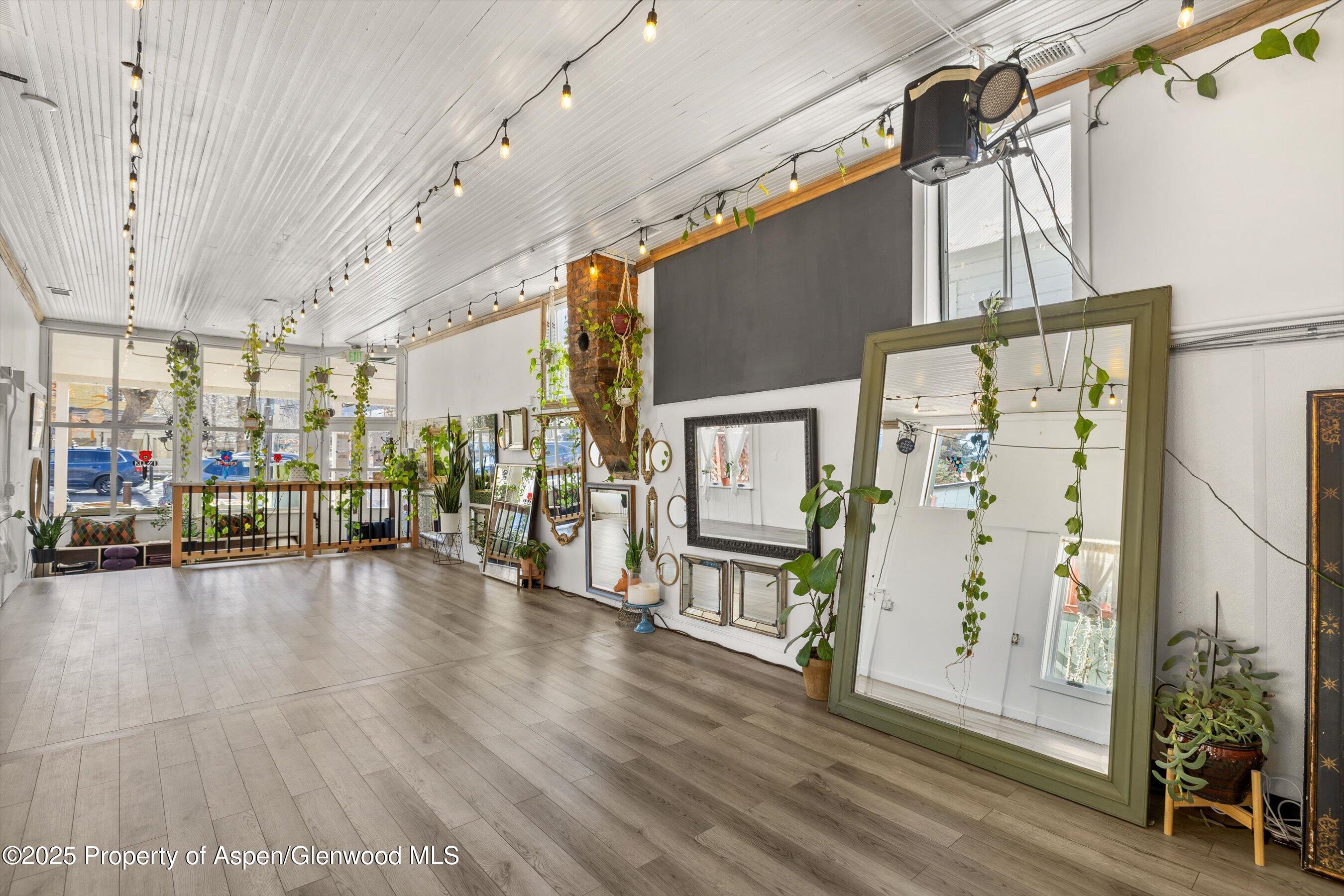 160 Midland Avenue Basalt, CO 81621 - Photo 8 of 13 a view of a hallway with wooden floor