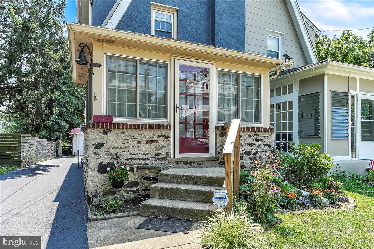 247 Sagamore Road Havertown, PA 19083 - Photo 3 of 41 a front view of a house with a garden