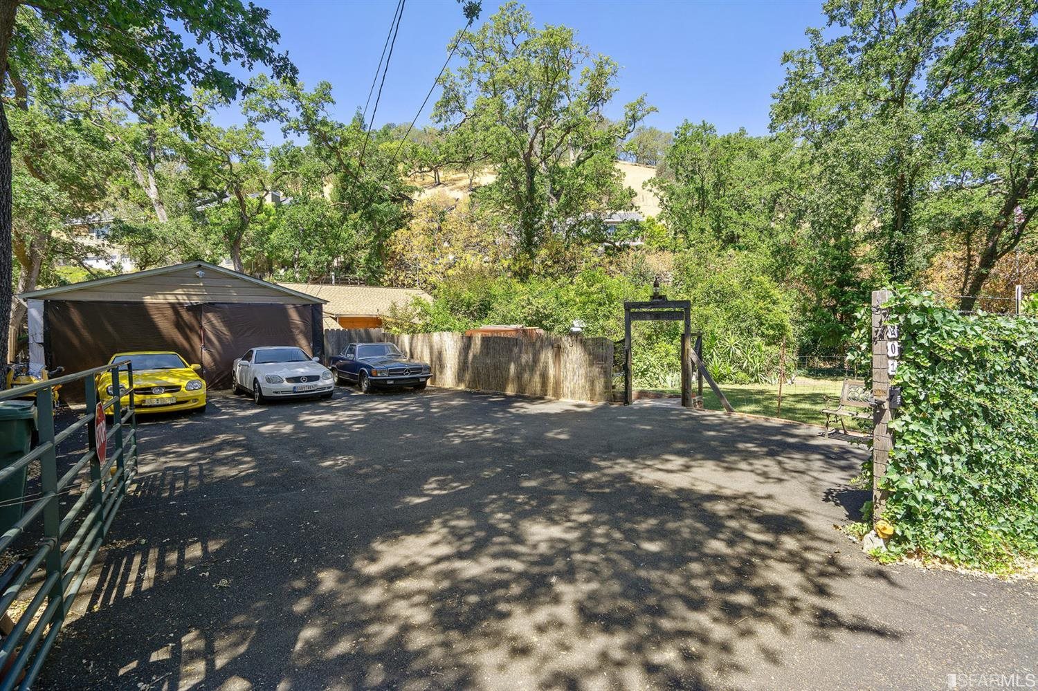 a view of a street with some trees