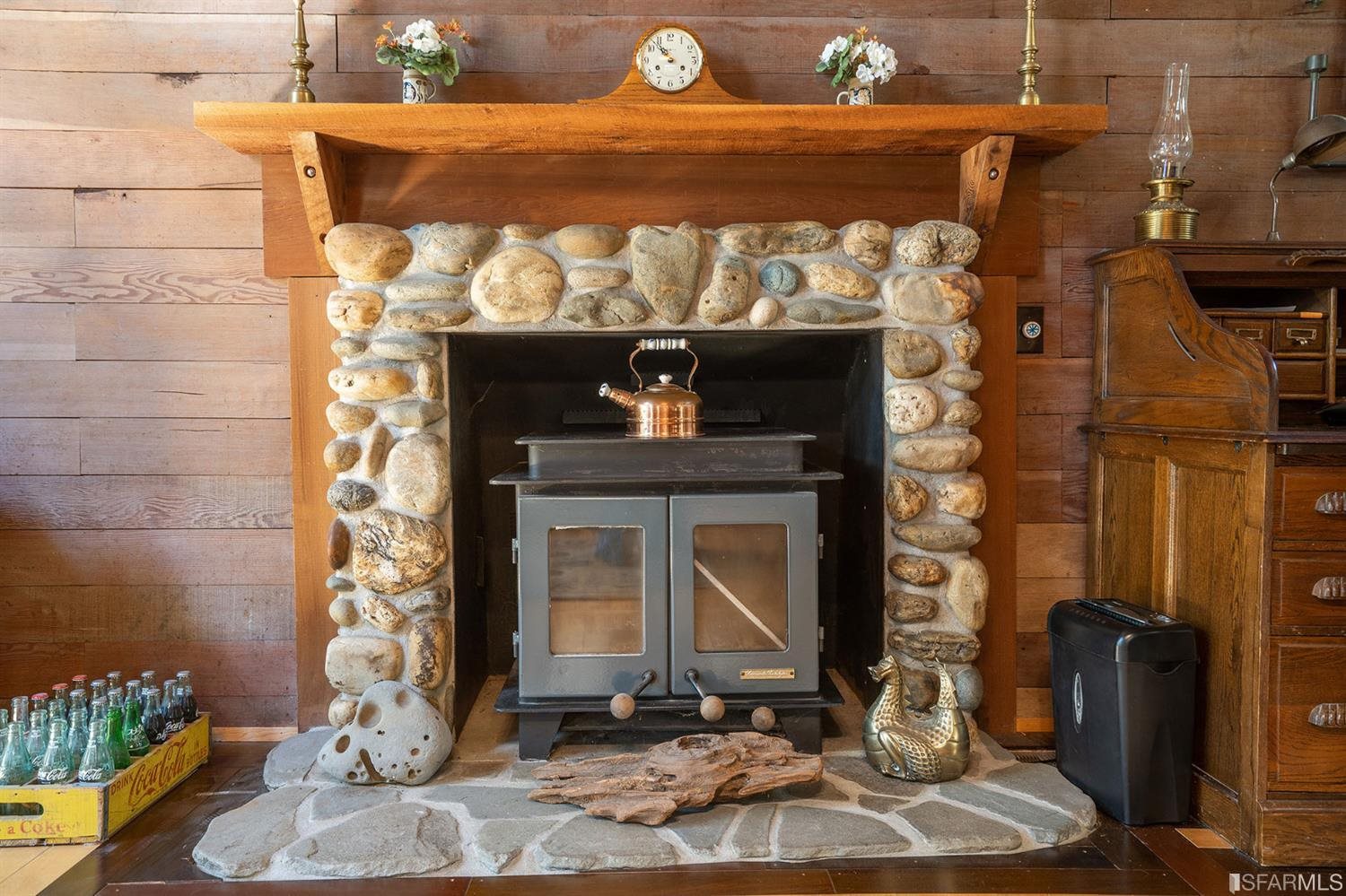201 Castle Hill Ranch Road Walnut Creek, CA 94595 - Photo 14 of 44 a front view of a fireplace with wooden floor