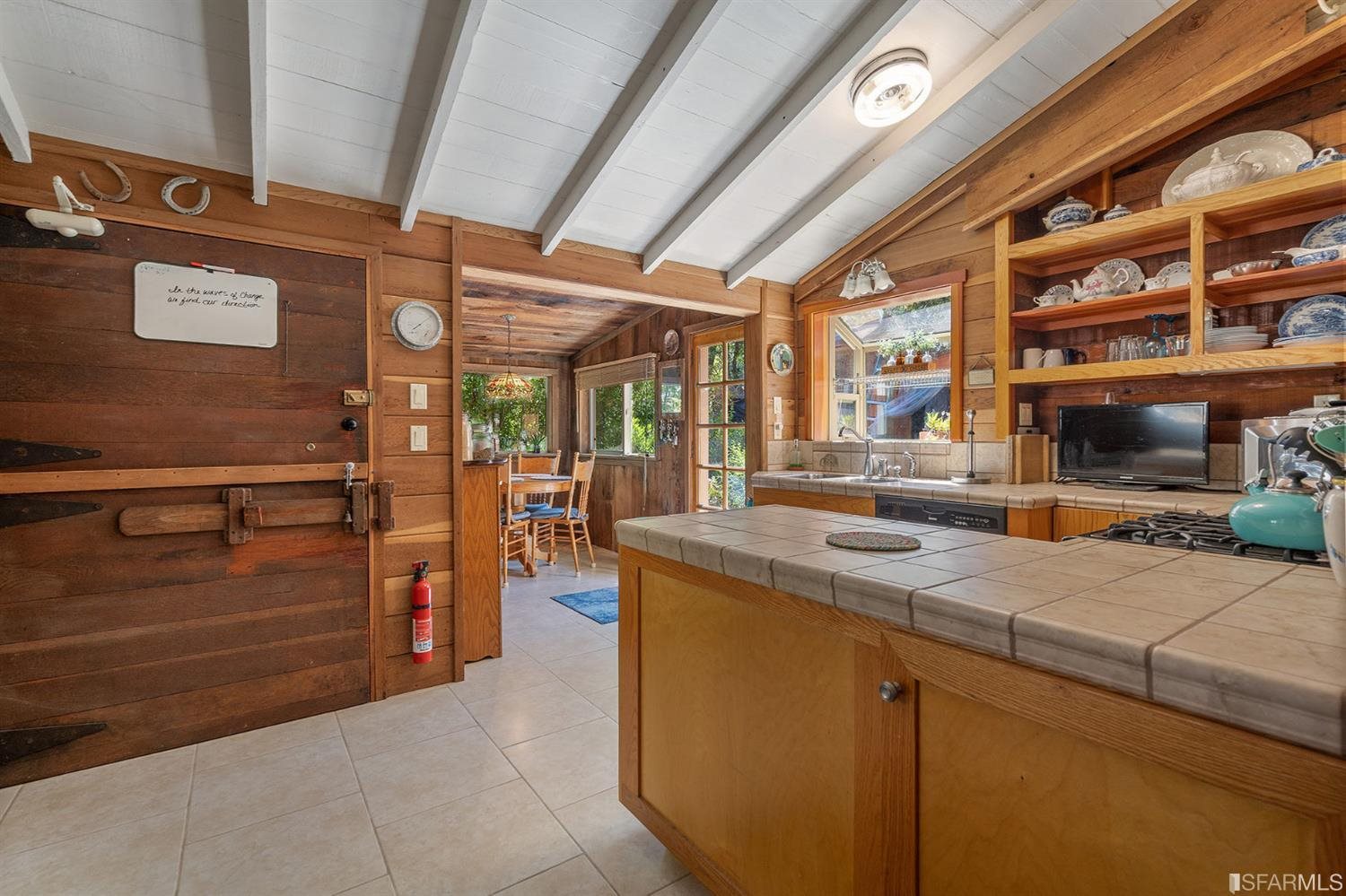 201 Castle Hill Ranch Road Walnut Creek, CA 94595 - Photo 18 of 44 a view of a kitchen with storage and utility