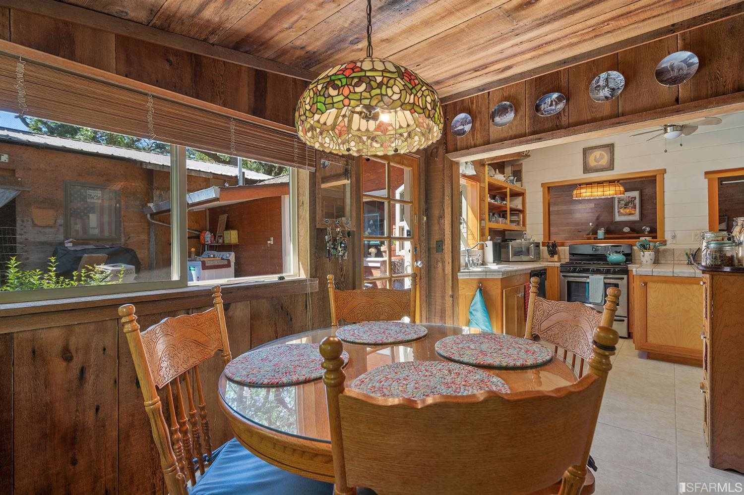201 Castle Hill Ranch Road Walnut Creek, CA 94595 - Photo 22 of 44 a dining table with chairs and window