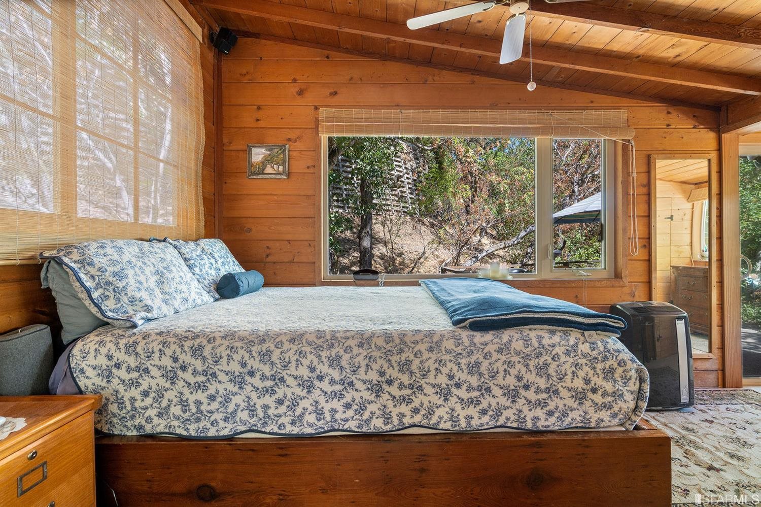 201 Castle Hill Ranch Road Walnut Creek, CA 94595 - Photo 23 of 44 a bed sitting in a bedroom next to a window