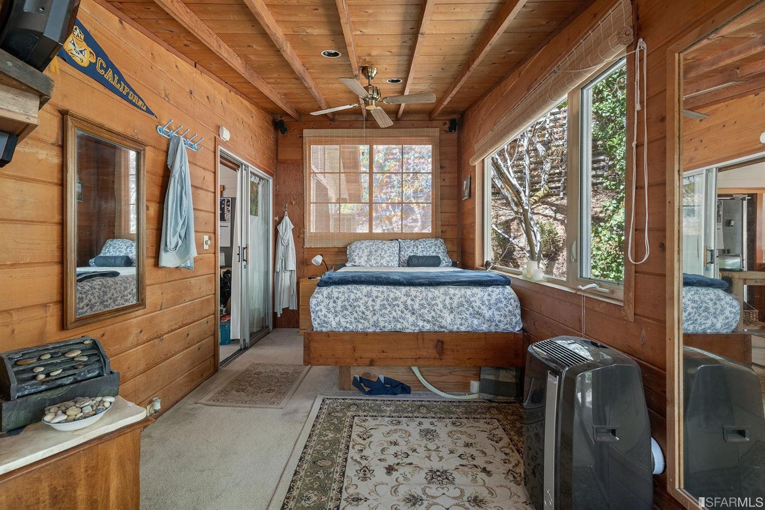 201 Castle Hill Ranch Road Walnut Creek, CA 94595 - Photo 24 of 44 a bedroom with furniture and a window