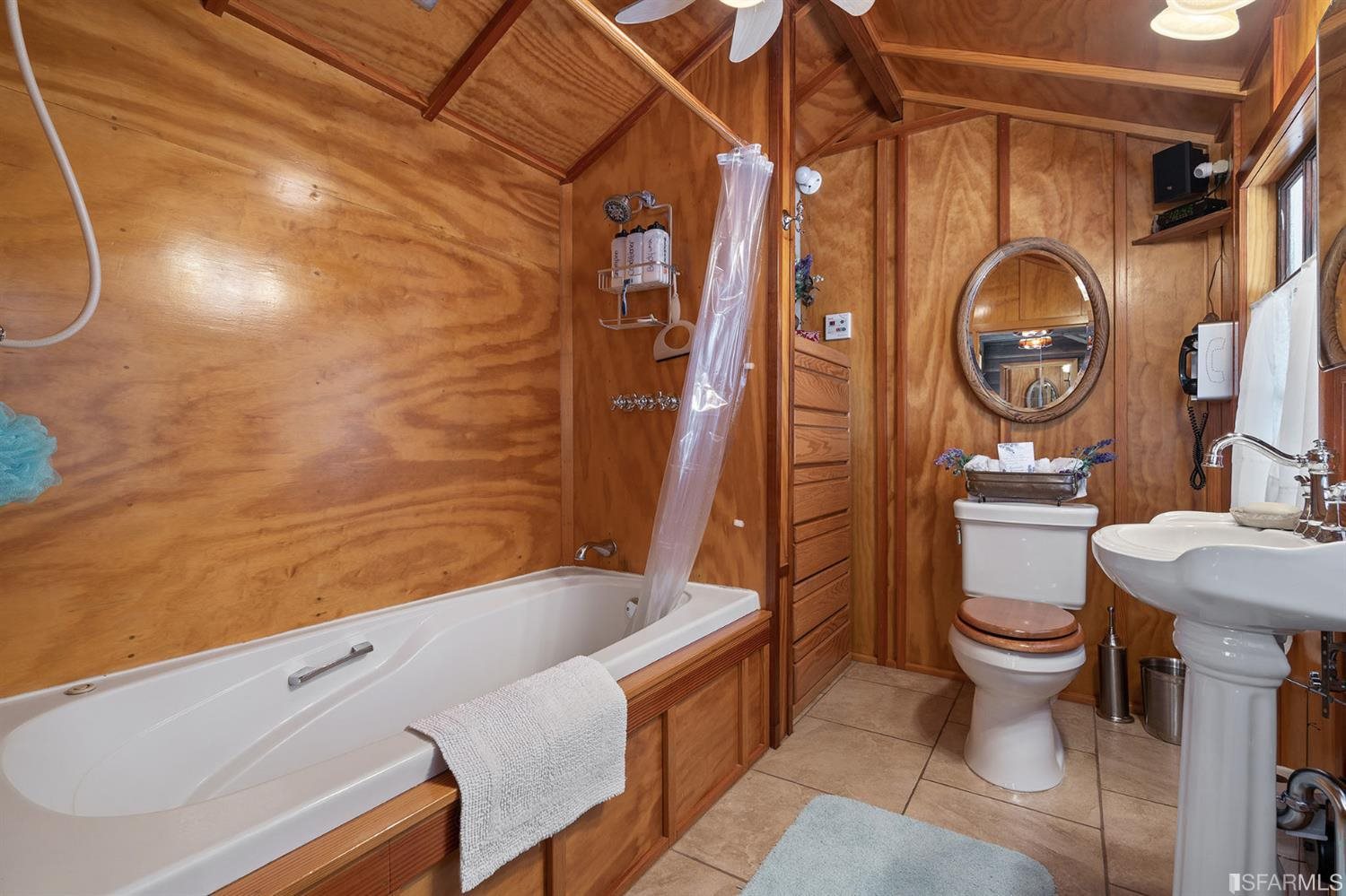 201 Castle Hill Ranch Road Walnut Creek, CA 94595 - Photo 27 of 44 a bathroom with a sink a toilet and a shower