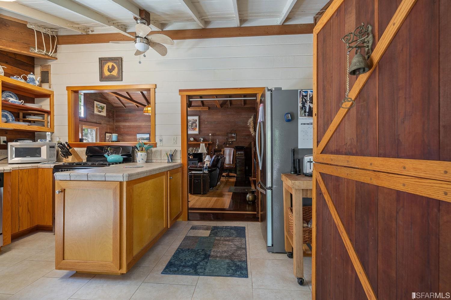 201 Castle Hill Ranch Road Walnut Creek, CA 94595 - Photo 8 of 44 a view of walk in closet with clothes and shoes