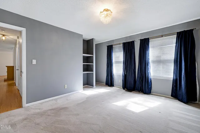 a view of storage and utility room with washer and dryer