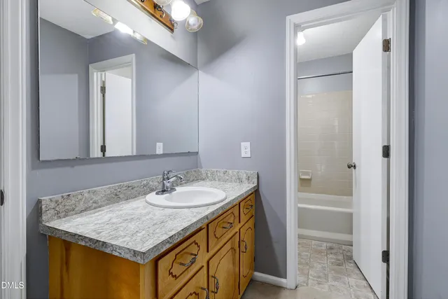 an aerial view of a house with outdoor space