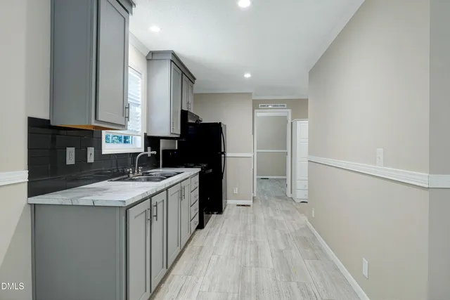 a view of backyard with green space