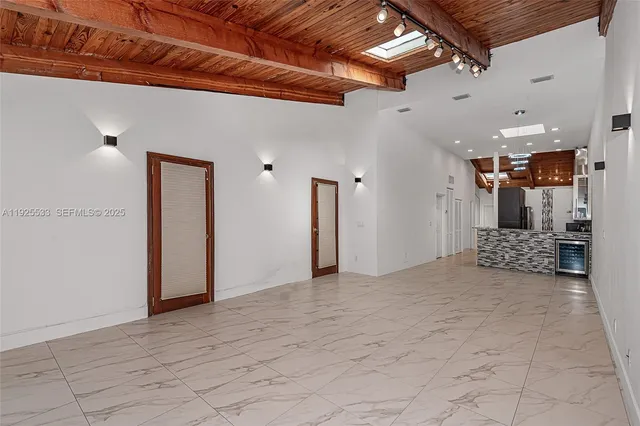 a view of a hallway with closet
