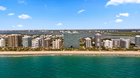 a view of a city with lawn chairs