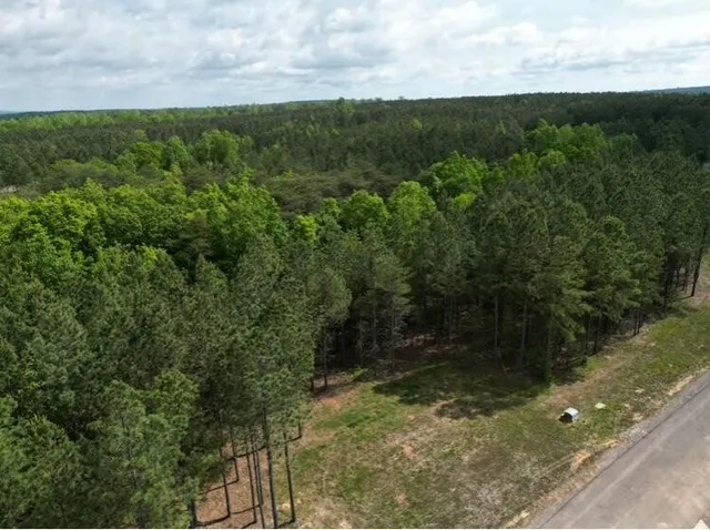a view of a balcony with floor to ceiling windows