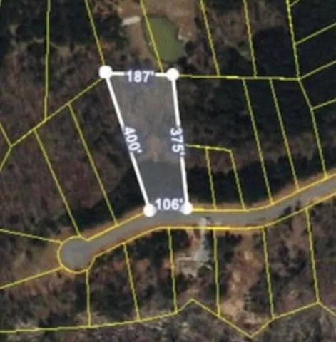 a sign that is on the wall with a white comforter