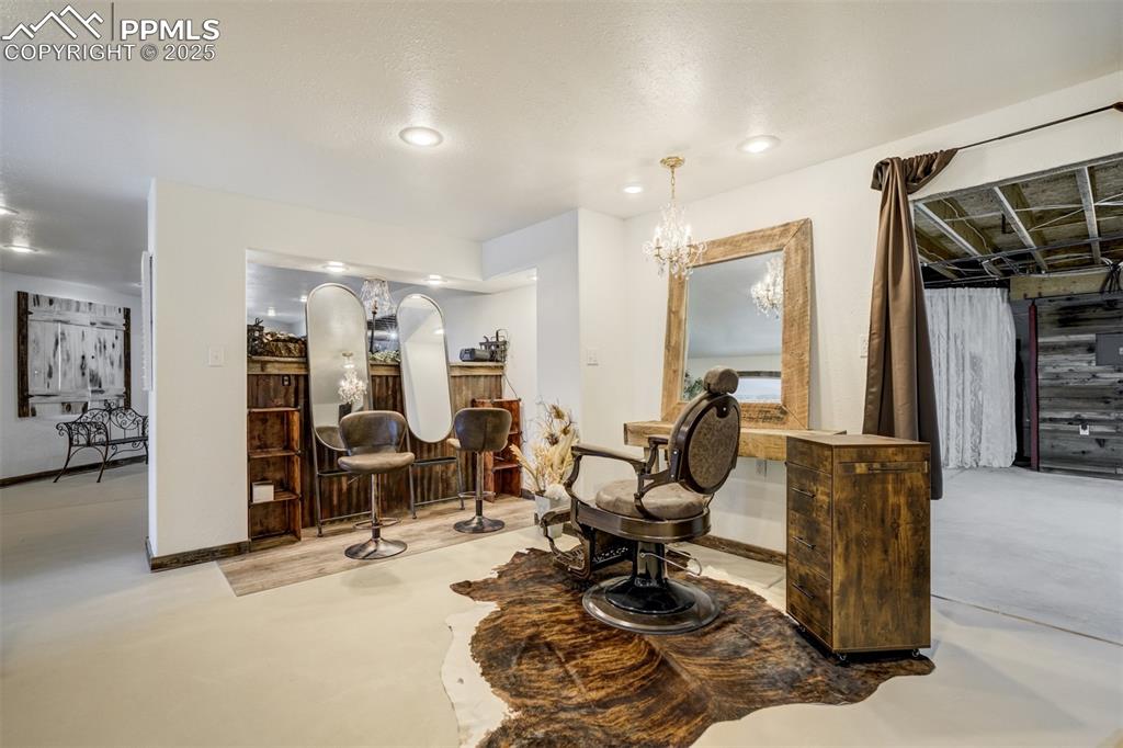 6275 Meridian Road Peyton, CO 80831 - Photo 21 of 50 a living room with furniture and gym equipment